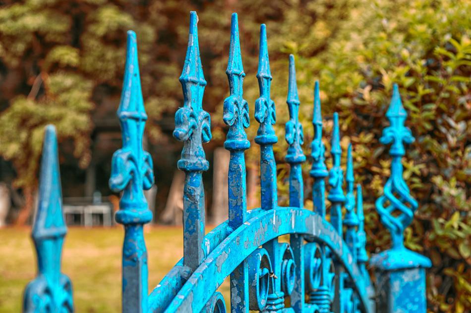 blue beautiful fence with a gate