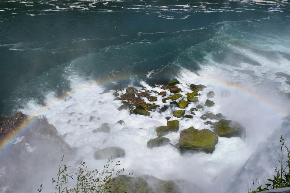 cute rainbow on a waterfall