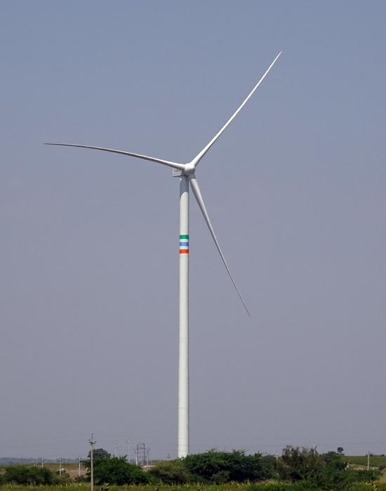 windmill in a green field