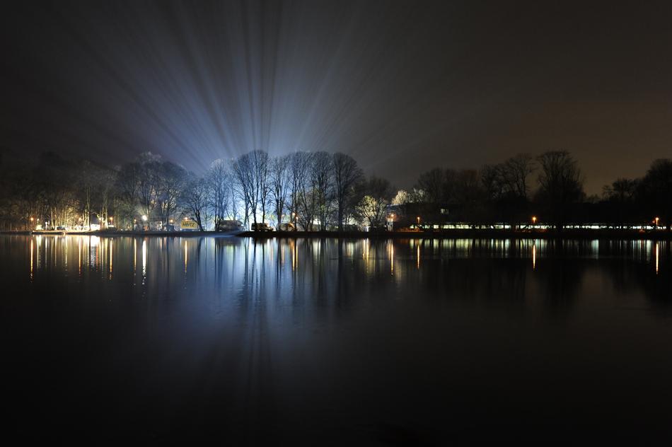 bright beams of light by the river