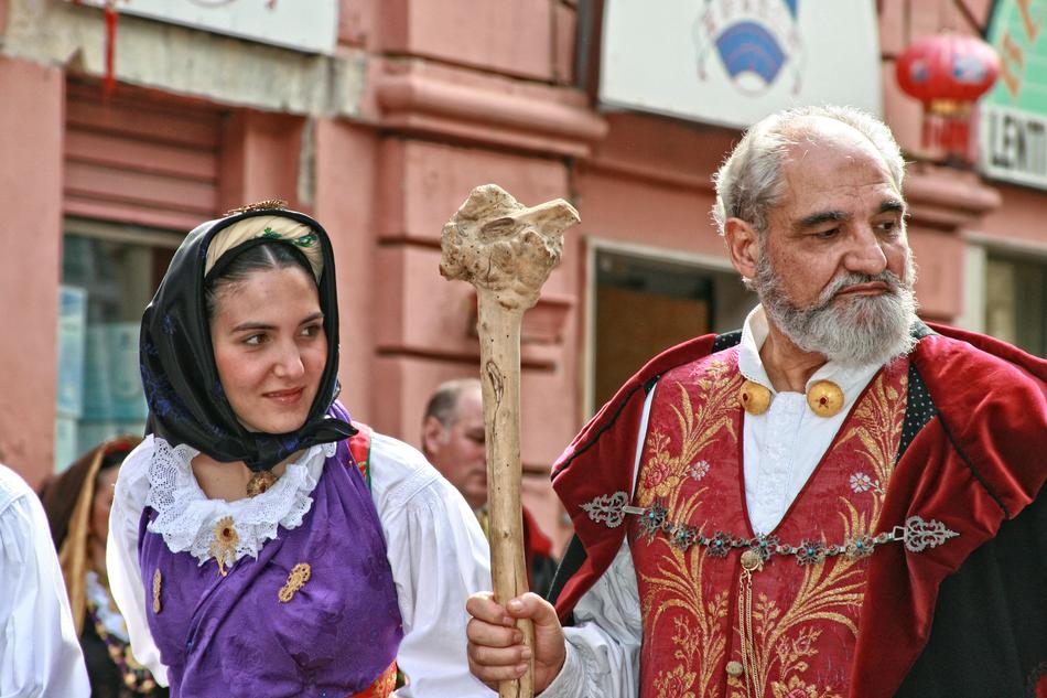 man and woman in traditional costumes