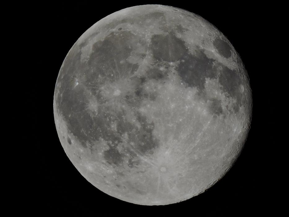 white moon on a black background