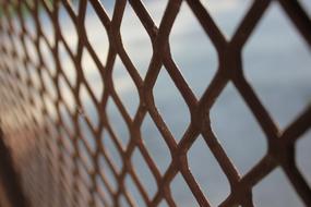 metal grating on the fence