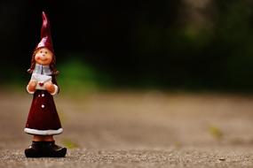 cute figure in a red hat
