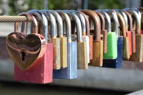 iron colored locks on the fence