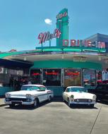 vintage cars near the cafe