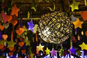 Twisted lamp decorated with colored stars