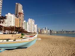 Beach Building Wooden Canoe