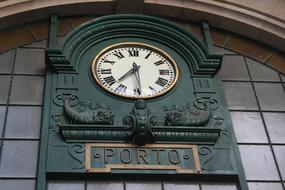 wall stone clock on the building