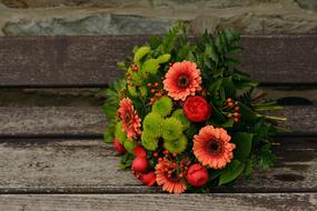 bouquet of flowers on the bench