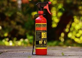 splashing bottle of poisonous liquid