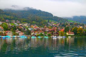 colored houses on lake island