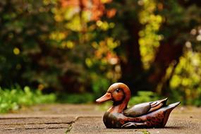 duck figurine in the park