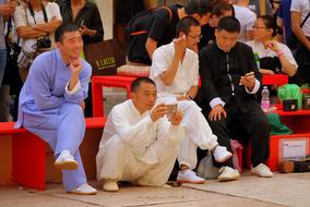 smiling judges at a chinese show