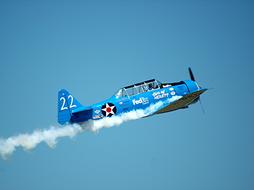 blue plane in the sky