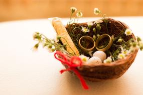 wedding rings in a basket