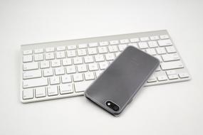 cell phone on the keyboard