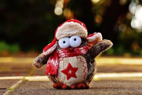 plush penguin in santa hat