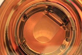 Close-up of the colorful, shiny photomultiplier tube