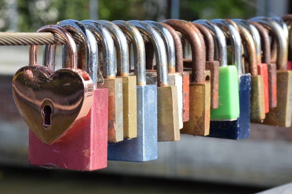 iron colored locks on the fence