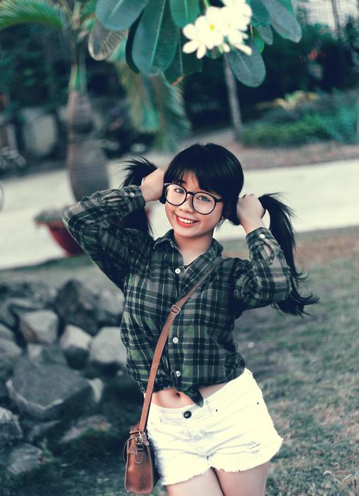 cute girl with ponytails