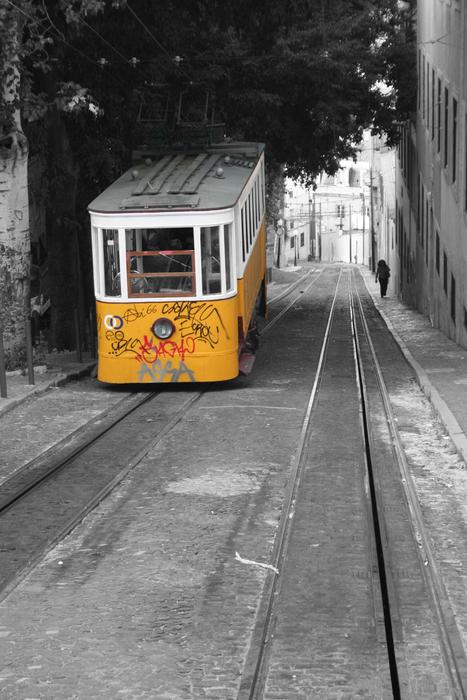 yellow streetcar in the distance