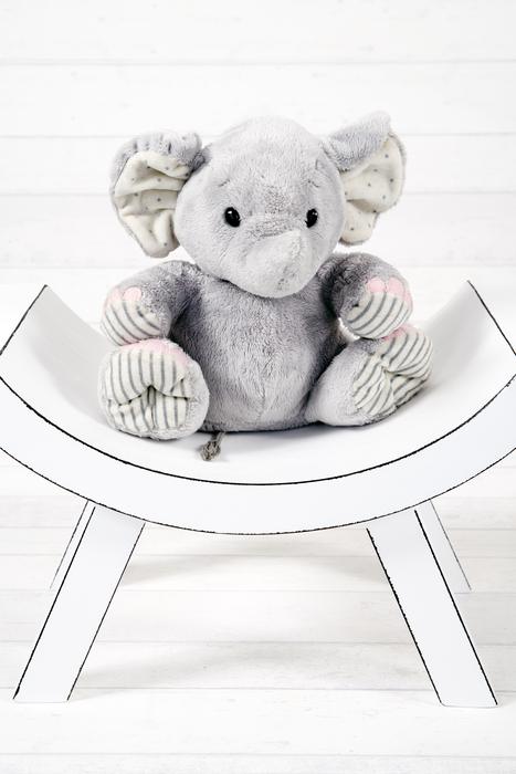 soft toy elephant on a chair