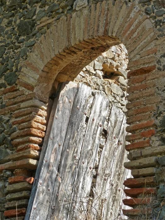 stone archway to the castle