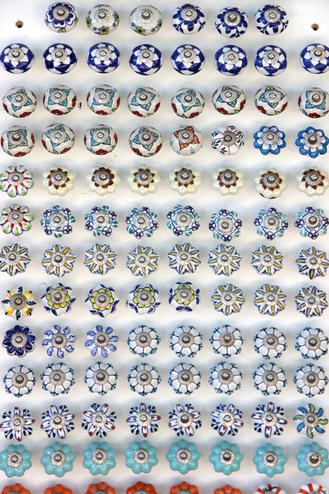 colored door handles on a white background