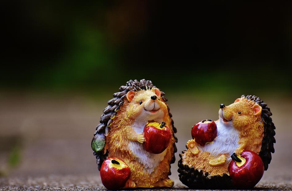 Hedgehog Figures Decoration ceramic on a blurred background