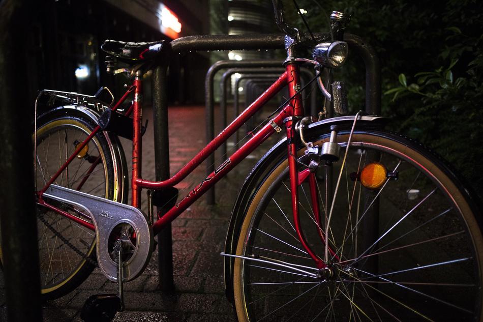 red bicycle against the wall