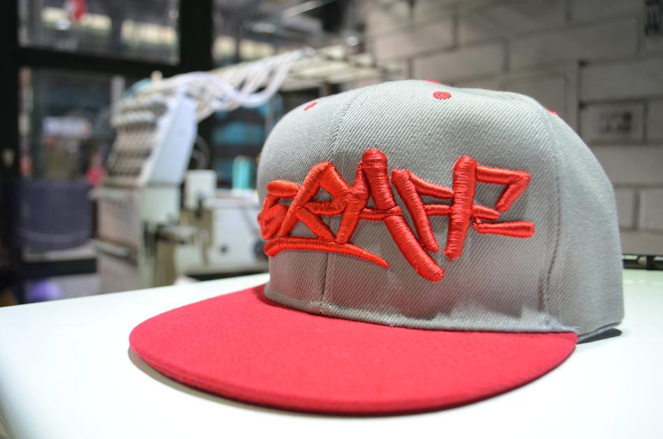 gray cap with signature