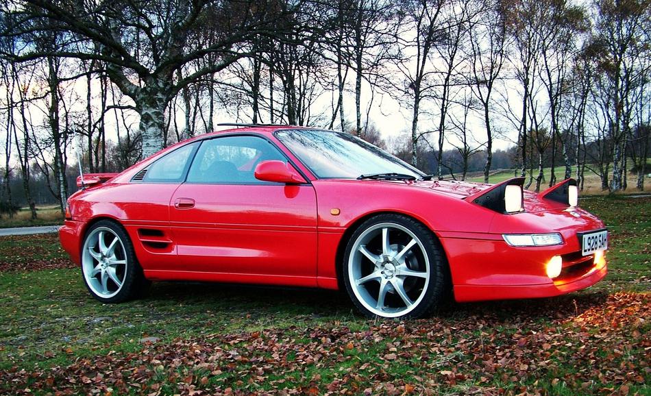 red car with retractable headlights