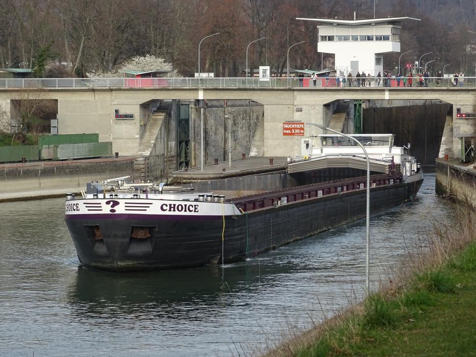 a black ship with a bridge of arches
