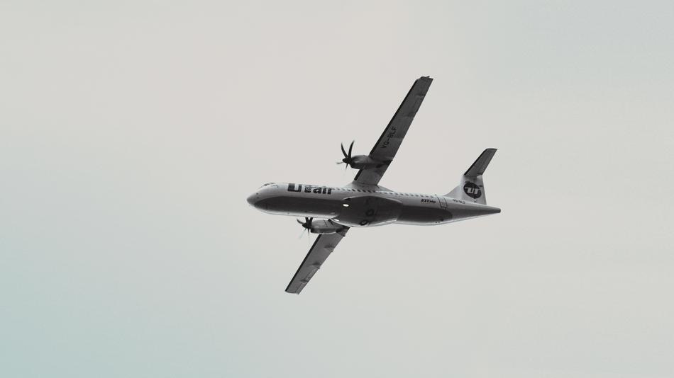 plane flying high in the sky