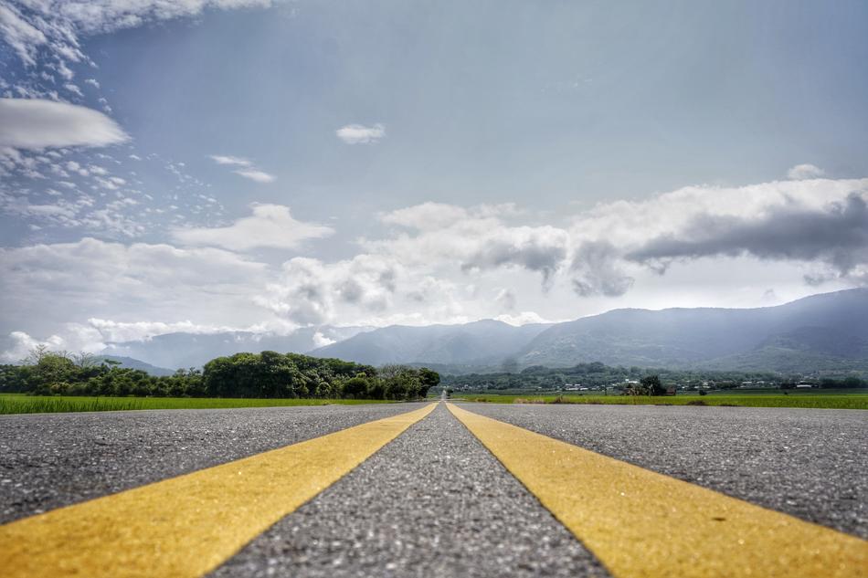 the road with yellow stripes
