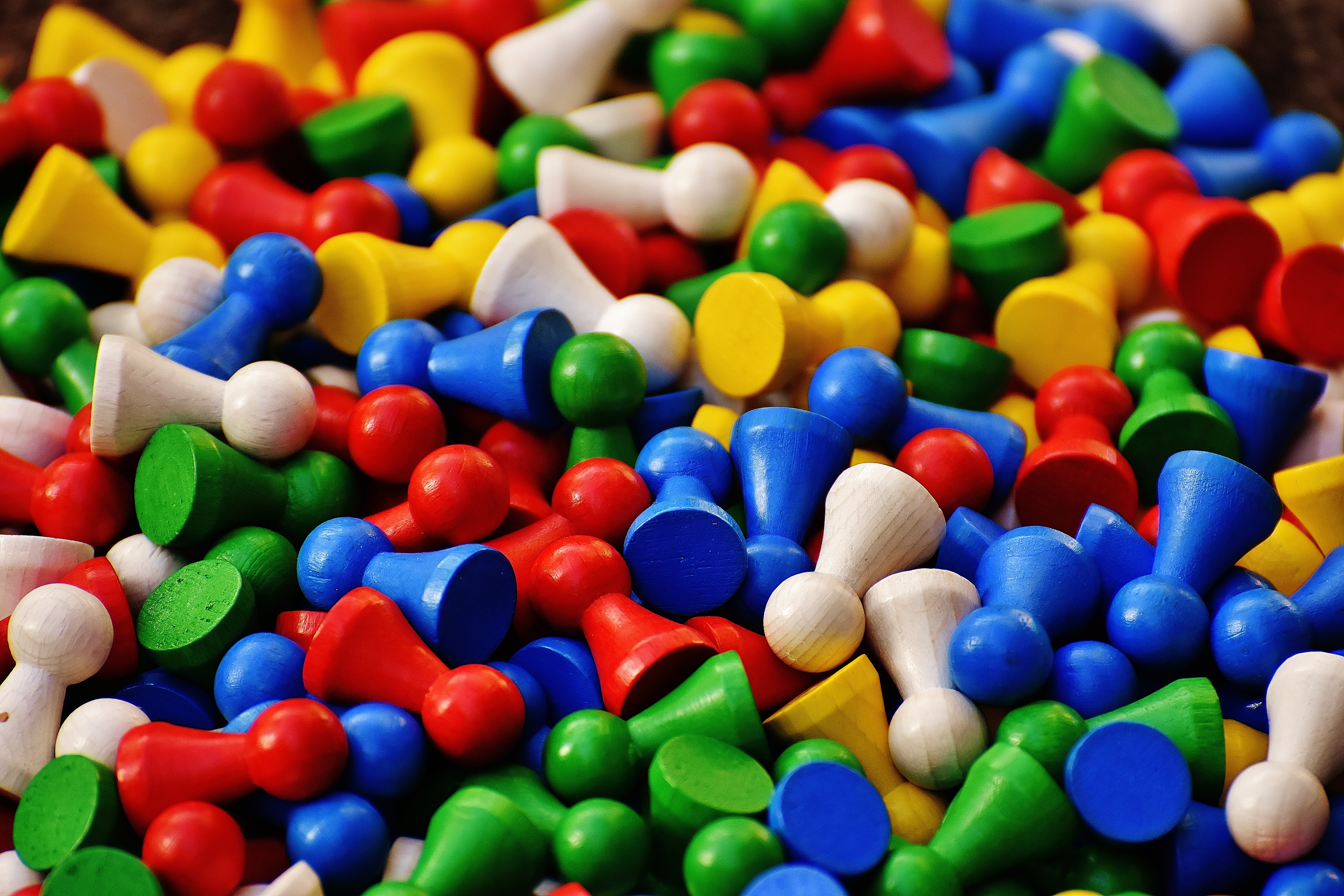 Play stones. Разноцветные конфетки с игрушкой. Игра с разноцветными камнями. Картинки детские для фона. Детские товары игрушки сладости фон.