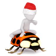 white man in a christmas hat on a ladybug