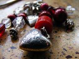 iron heart with stones on the table