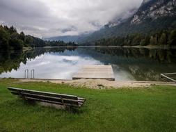 Mountains and lake bank