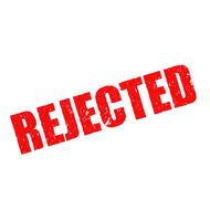 red rejection stamp on the paper