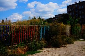 colorful metal Fence in city