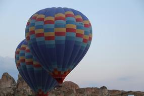 colored balloons take off