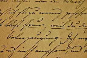 italic handwriting in a book