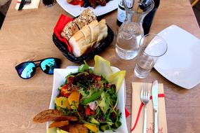 salad and glasses on the table