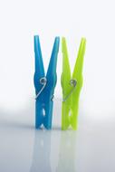 colored clothespins on a white background