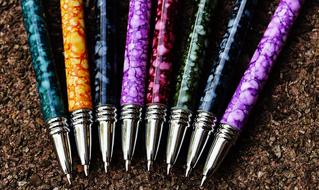 colored pens on the floor