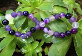 purple beads in the sign of infinity