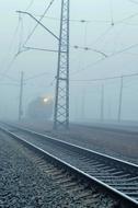 view of the railroad in the fog