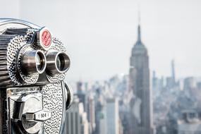 iron binoculars near the city